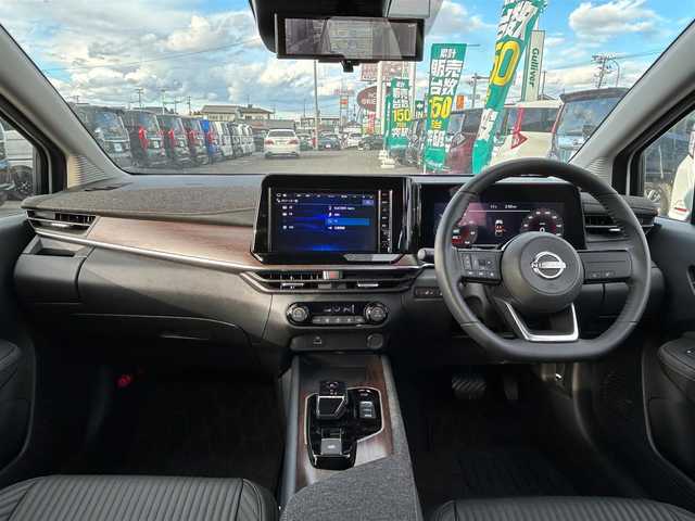 日産 オーラ G レザーエディション 宮城県 2023(令5)年 0.1万km ピュアホワイトパール 純正9インチナビ/(フルセグTV/SD/BT/USB/AUX)/アラウンドビューモニター/エマージェンシーブレーキ/衝突軽減サポート/レーンキープアシスト/ブラインドスポットモニター/パーキングセンサー/後退時車両検知警報/標識認識支援/ふらつき防止/インテリジェントルームミラー/革巻きステアリング/ステアリングスイッチ/レザーシート/コーナーセンサー/アイドリングストップ/オートエアコン/オートライト/オートマチックハイビーム/オートホールド/ドライブセレクトモード/プッシュスタート＆スマートキ/ウインカー付き電動格納ミラー/LEDヘッドライト/フォグランプ/純正フロアマット/純正17インチAW