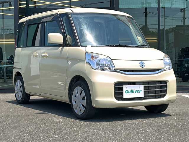 スズキ スペーシア X 鹿児島県 2015(平27)年 1.1万km シフォンアイボリーM ダブルエアバック/社外オーディオ/　　CD/AUX/USB入力端子/片側パワースライドドア/ハロゲンヘッドライト/シートヒーター/純正アルミホイール14インチ/アイドリングストップ/スマートキー