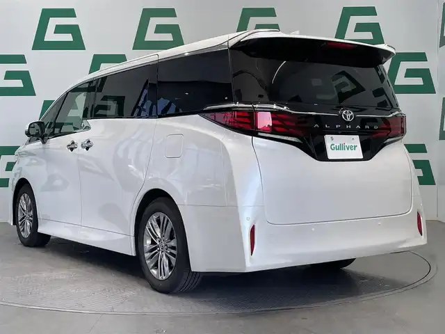 トヨタ アルファード Z 鹿児島県 2024(令6)年 0.5万km プラチナホワイトパールマイカ ワンオーナー/禁煙車/14インチディスプレイオーディオ（コネクティッドナビ対応)/全周囲カメラ/前後コーナーセンサー/トヨタセーフティセンス/運転席メモリー機能付きパワーシート/前後席パワーシート/前後席シートベンチレーション/前後席シートヒーター/両側パワースライドドア/パワーバックドア/デジタルインナーミラー/ステアリングヒーター/ブラインドスポットモニター/ワイヤレス充電/ビルトインETC2.0/前後ドライブレコーダー/純正フロアマット/保証書/記録簿