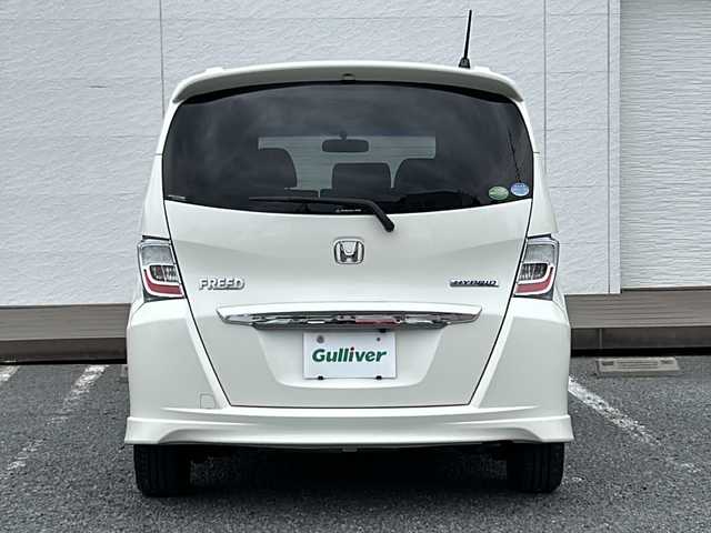 ホンダ フリード ハイブリット ジャストセレクション 千葉県 2012(平24)年 19.7万km プレミアムホワイトパール 純正ナビ/バックカメラ/クルーズコントロール/地デジ/ＥＴＣ/本革巻ハンドル/両側パワースライドドア/スマートキー/純正フロアマット/オートライト/純正アルミホイール/盗難防止装置/ハーフレザーシート