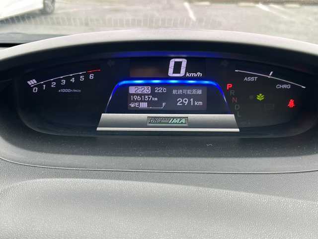 ホンダ フリード ハイブリット ジャストセレクション 千葉県 2012(平24)年 19.7万km プレミアムホワイトパール 純正ナビ/バックカメラ/クルーズコントロール/地デジ/ＥＴＣ/本革巻ハンドル/両側パワースライドドア/スマートキー/純正フロアマット/オートライト/純正アルミホイール/盗難防止装置/ハーフレザーシート
