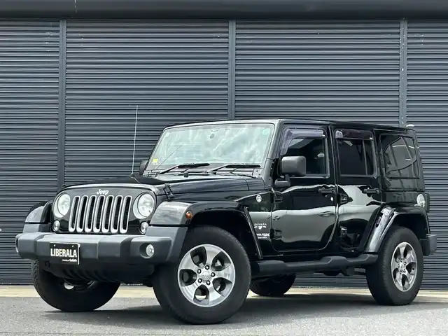 クライスラー・ジープ ジープ ラングラー アンリミテッド サハラ 茨城県 2018(平30)年 3.1万km 黒 後期型　/ワンオーナー　/ナビ　/１２セグ　/ＢＴ　/ＤＶＤ　/バック／サイドカメラ　/ハードトップタイヤカバー　/ＡＬＰＩＮＥサウンド　/サブウーハー　/ＨＩＤヘッドライト　/ＥＴＣ　/ドラレコ　/純正１８インチＡＷ　/禁煙車