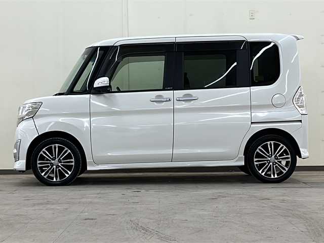 ダイハツ タント カスタム RS トップED SA 道央・札幌 2014(平26)年 3.6万km パールホワイトⅢ /4WD//純正ナビ：NMCK-W64/（CD/DVD/SD/ラジオ/ワンセグ）//バックカメラ//両側パワースライドドア//アイドリングストップ//横滑り防止装置//衝突被害軽減システム//ETC//ステアリングスイッチ//オートエアコン//オートライト//フォグライト//スマートキー//電動格納ミラー