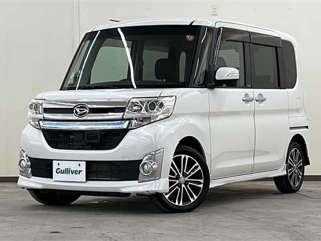ダイハツ タント カスタム RS トップED SA 道央・札幌 2014(平26)年 3.6万km パールホワイトⅢ /4WD//純正ナビ：NMCK-W64/（CD/DVD/SD/ラジオ/ワンセグ）//バックカメラ//両側パワースライドドア//アイドリングストップ//横滑り防止装置//衝突被害軽減システム//ETC//ステアリングスイッチ//オートエアコン//オートライト//フォグライト//スマートキー//電動格納ミラー
