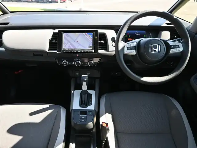 ホンダ フィット e:HEVクロスター 千葉県 2021(令3)年 1.9万km サーフブルー ホンダセンシング/・衝突軽減ブレーキ（CMBS）/・車線維持支援システム（LKAS）/・アダプティブクルーズコントロール（ACC）/・後方誤発進抑制機能/・誤発進抑制機能/純正SDナビ/地デジTV/【DVD/CD再生機能　Bluetooth接続】/バックカメラ/ドライブレコーダー（前後撮影）/ETC/LEDヘッドライト/ウインカーミラー/コーナーセンサー/純正16インチアルミホイル/サイド/カーテンエアバッグ/Honda スマートキー