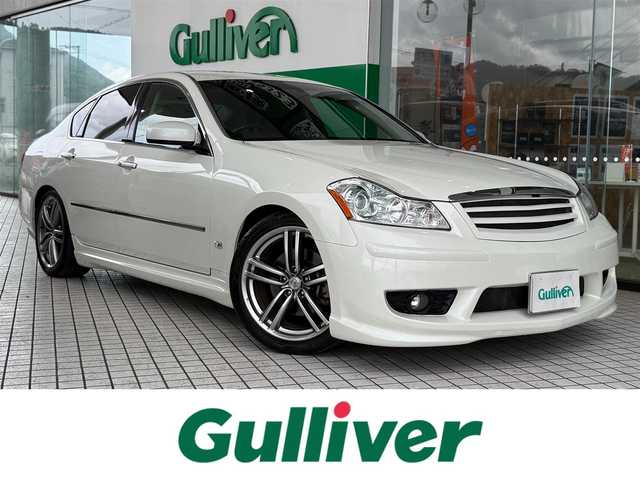 日産 フーガ 350GT スポーツパッケージ 京都府 2004(平16)年 7.9万km ホワイトパール BOSEサウンドシステム/黒革シート/前席エアーシート/シートヒーター/純正DVDマルチナビ、TV/バック、サイドカメラ/クルーズコントロール/ステアリングスイッチ/ビルトインETC/前席パワーシート/運転席メモリーシート/助手席オットマン/社外車高調/社外エアロ/純正19インチアルミホイール/スペアキー