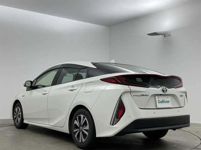 トヨタ プリウス ＰＨＶ S ナビパッケージ 岡山県 2019(令1)年 3.9万km ホワイトパールクリスタルシャイン 純正11.6インチナビ/(USB/フルセグTV/Bluetooth)/パノラマミックビューモニター/純正ドライブレコーダー/ステアリングスイッチ/ETC2.0/プリクラッシュセーフティ/レーンディパーチャーアラート/レーダークルーズコントロール/オートハイビームアシスト/LEDオートヘッドライト/純正フロアマット/純正ドアバイザー