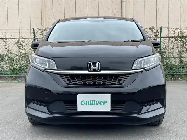 ホンダ フリード＋ G ホンダセンシング 東京都 2022(令4)年 6万km クリスタルブラックパール 純正Gathersナビ/バックカメラ/ETC/アダプティブクルーズコントロール/スマートキー/スペアキー/前後ドライブレコーダー/純正フロアマット/ハーフレザーシート/シートヒーター/両側パワースライドドア/純正15インチアルミホイール/後ろコーナーセンサー/純正LEDヘッドライト/Bluetooth/フルセグテレビ/MSV/USB入力端子