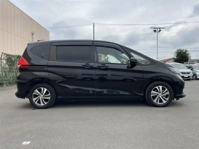 ホンダ フリード＋ G ホンダセンシング 東京都 2022(令4)年 6万km クリスタルブラックパール 純正Gathersナビ/バックカメラ/ETC/アダプティブクルーズコントロール/スマートキー/スペアキー/前後ドライブレコーダー/純正フロアマット/ハーフレザーシート/シートヒーター/両側パワースライドドア/純正15インチアルミホイール/後ろコーナーセンサー/純正LEDヘッドライト/Bluetooth/フルセグテレビ/MSV/USB入力端子