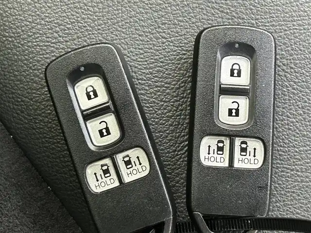 ホンダ Ｎ ＢＯＸ カスタム G L ターボ ホンダセンシング 熊本県 2019(令1)年 3.5万km ブリリアントスポーティブルーメタリック2トーン 純正８インチナビVXU-195NBi（ＣＤ・ＤＶＤ・フルセグ・ＢＴ・ＳＤ・ＡｐｐｌＣａｒＰｌａｙ・ＵＳＢ）/バックカメラ　/社外前後ドライブレコーダー　/ビルトインＥＴＣ　/両側パワースライドドア　/レーダークルーズコントロール/衝突軽減ブレーキ/レーンキープアシスト/横滑り防止/アイドリングストップ/車線逸脱警報/ハーフレザーシート/純正フロアマット/純正１５インチAW/オートライト/LEDヘッドライト/フォグライト/スマートキー/プッシュスタート/スペアキー1本/取扱説明書