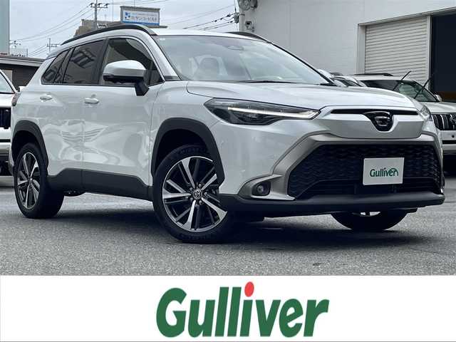 トヨタ カローラ クロス ハイブリッド Z 福岡県 2024(令6)年 0.4万km プラチナホワイトパールマイカ ワンオーナー/純正メーカーナビ/（Bluetooth対応/フルセグTV/AM/FM）/アラウンドビューモニター/ブラインドスポットモニター/運転席パワーシート/前席シートヒーター/クルーズコントロール/バックカメラ/フロントカメラ/ETC2.0/ルーフレール/パワーバックドア/プッシュスタート/純正フロアマット/純正アルミホイール/コーナーセンサー（前後）/保証書/取扱説明書/スマートキー