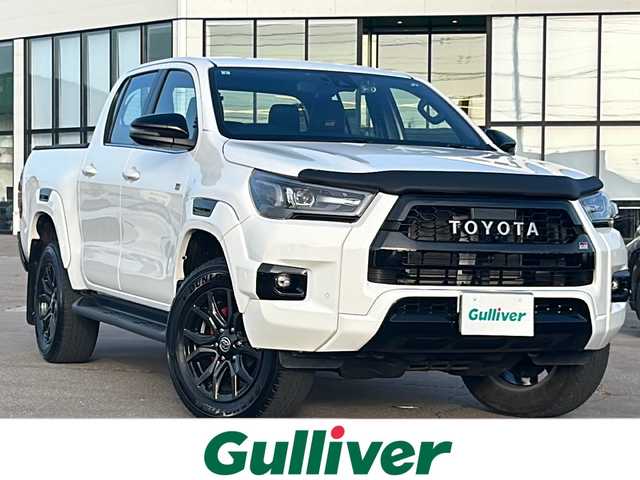 トヨタ ハイラックス Z GRスポーツ 道南・函館 2023(令5)年 2.4万km スーパーホワイトⅡ ・純正ディスプレイオーディオ/・純正エンジンスターター/・ドライブレコーダー前後/・パノラミックビューモニター/・EGRボンネットバグガード/・LADDER FRAME　ソフトトノカバー/・Clazzioラバーマット/・GRスポーツ専用ハーフレザーシート/・運転席パワーシート/・純正マッドガード/・LEDヘッドライト/・オートライト/・プリクラッシュセーフティ/・レーダークルーズコントロール/・クリアランスソナー/・スマートキー/・エンジンプッシュスタート