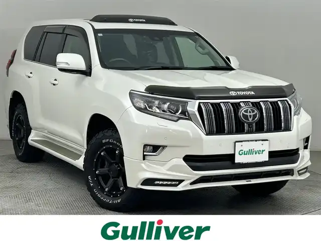 トヨタ ランドクルーザー プラド TZ－G 道央・札幌 2020(令2)年 6.8万km ホワイトパールクリスタルシャイン ・4WD/・寒冷地仕様/・サンルーフ/・トヨタセーフティセンス/・プリクラッシュセーフティ/・レーンキープアシスト/・レーダークルーズコントロール/・オートハイビーム/・先行車発進告知/・標識認識システム/・ブラインドスポットモニター/・センターデフロック/・リアエアサス自動乗降モード/・マルチテレインセレクト/・純正ディスプレイオーディオ/・ナビ機能/フルセグ/BT/・アラウンドビューモニター/・パワーシート/・シートヒーター&クーラー/・シートメモリ/・レザーシート/・ヒッチメンバー/・純正ドライブレコーダー/・LEDヘッドライト