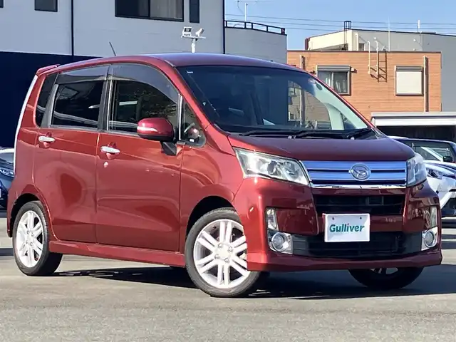 ダイハツ ムーヴ カスタム RS SA 静岡県 2014(平26)年 5.9万km ファイアークォーツレッドM エンジンスタートボタン/パワーウィンドウ/パワーステアリング/アイドリングストップ/ターボ/スマートキー/オートエアコン/ベンチシート/純正フロアマット/純正アルミホイール/布シート/ABS/横滑り防止装置/盗難防止装置/オートライト/LEDヘッドライト/Wエアバッグ/衝突軽減システム/momoステアリング