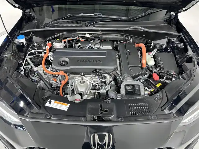 ホンダ ＺＲ－Ｖ ハイブリッド e:HEV Z 佐賀県 2024(令6)年 1.1万km クリスタルブラックパール 純正9インチホンダコネクティッドナビ【MY22ADA】/フルセグTV/Bluetooth/BOSEプレミアムサウンド/全方位バックカメラ/衝突被害軽減システム/レーダークルーズコントロール/ブラインドスポットモニター/レーンアシスト/先行車発進のお知らせ機能/ロードサインアシスト/クリアランスソナー/オートライト/オートマチックハイビーム/ダウンヒルアシストコントロール/ブレーキホールド/置くだけ充電/パワーバックドア/ビルトインETC2.0/前後ドライブレコーダー/ステアリングヒーター/運転席・助手席パワーシート/運転席・助手席シートヒーター/レザーシート/パドルシフト/オートワイパー/ISOFIX対応シート/LEDヘッドライト/フォグライト/スペアキー×１/禁煙車
