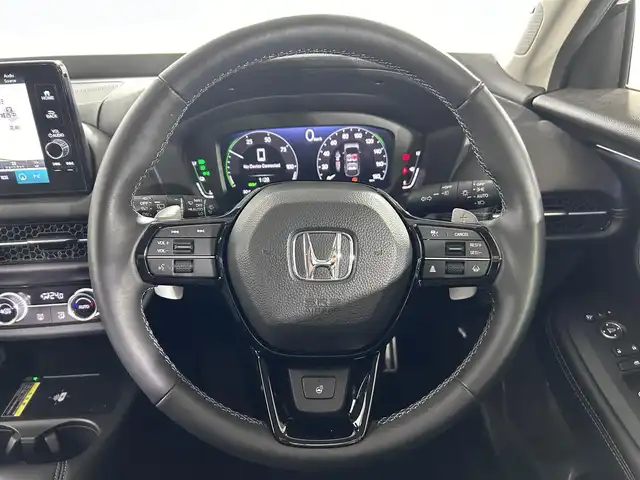 ホンダ ＺＲ－Ｖ ハイブリッド e:HEV Z 佐賀県 2024(令6)年 1.1万km クリスタルブラックパール 純正9インチホンダコネクティッドナビ【MY22ADA】/フルセグTV/Bluetooth/BOSEプレミアムサウンド/全方位バックカメラ/衝突被害軽減システム/レーダークルーズコントロール/ブラインドスポットモニター/レーンアシスト/先行車発進のお知らせ機能/ロードサインアシスト/クリアランスソナー/オートライト/オートマチックハイビーム/ダウンヒルアシストコントロール/ブレーキホールド/置くだけ充電/パワーバックドア/ビルトインETC2.0/前後ドライブレコーダー/ステアリングヒーター/運転席・助手席パワーシート/運転席・助手席シートヒーター/レザーシート/パドルシフト/オートワイパー/ISOFIX対応シート/LEDヘッドライト/フォグライト/スペアキー×１/禁煙車