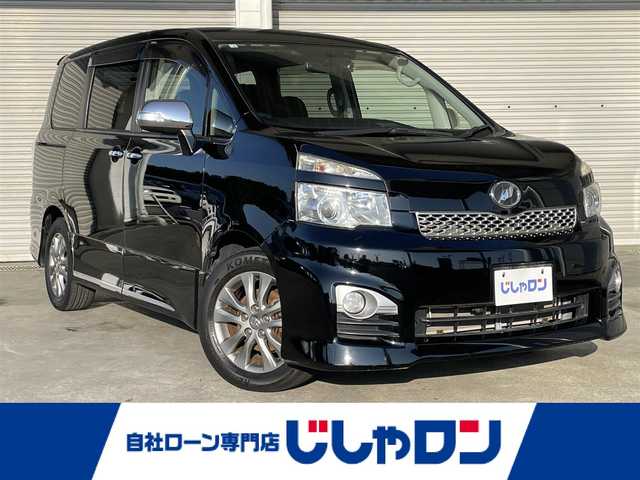 トヨタ ヴォクシー ZS 煌Ⅱ 茨城県 2012(平24)年 8.3万km ブラック (株)IDOMが運営する【じしゃロン水戸店】の自社ローン専用車両になりますこちらは現金またはオートローンご利用時の価格です。自社ローンご希望の方は別途その旨お申付け下さい/純正HDDナビ/ビルトインETC/両側パワースライドドア/フリップダウンミニター/パドルシフト