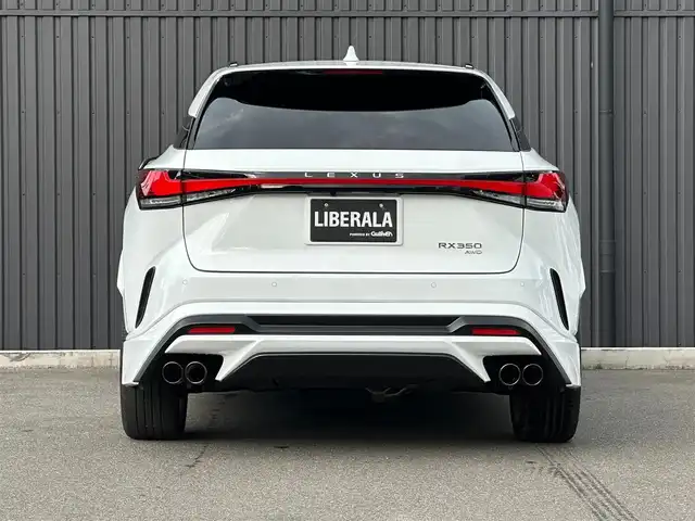 レクサス ＲＸ 350 Fスポーツ 福島県 2024(令6)年 1.6万km ホワイトノーヴァガラスフレーク ・ワンオーナー/・OP パノラマルーフ（ルーフレール同時装着）/・OP オレンジキャリパー（LEXUSロゴ）/・OP Lexus Teammate PKSB/・OP デジタルインナーミラー/・OP 輻射ヒーター/（後席4:2:4分割可倒式シート/電動リクライニング/電動格納/後席シートヒーター/ベンチレーション）/・TRDフロントスポイラー/・TRDサイドスカート/・TRDスポーツマフラー&リヤディフューザー/・14インチタッチディスプレイオーディオ/・地デジ/BT/USB/HDMI/Miracast/・パノラミックビュ－モニター（床下透過表示）/・カラーヘッドアップディスプレイ/・赤革/ウルトラスエードシート/・シートヒーター/シートベンチレーション/・パワーバックドア/・3眼フルLEDヘッドライト/・純正21インチAW/・パドルシフト/・ビルトインETC2.0/・スペアキー/カードキーあり/【セーフティ】//Lexus Teammate Advanced Drive//PCS/LDA/LTA/LCA/AHS/RSA/TMN//FCTA/PDA/レーダークルーズコントロール//BSM/SEA/RCTA/ドライバーモニター//クリアランスソナー/RCD/発進遅れ告知機能
