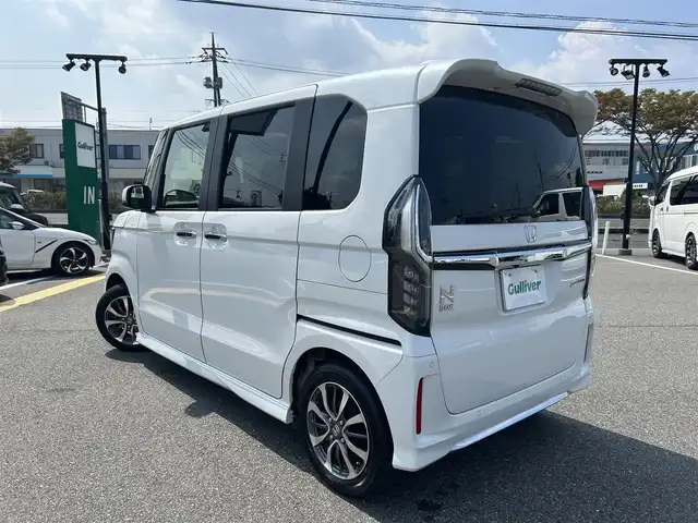 ホンダ Ｎ ＢＯＸ カスタム L 鳥取県 2023(令5)年 4.5万km プラチナホワイトパール ワンオーナー/社外ナビ/フルセグ/DVD/CD/USB/HDMI/バックカメラ・ETC/前席シートヒーター/ホンダセンシング/ステアリングスイッチ対応/レーダークルーズコントロール/レーンキープアシスト/片側パワースライドドア/LEDヘットライト/LEDフォグライト/純正14インチアルミホイール/プッシュエンジンスタート/アイドリングストップ/フロアマット/保証書/取扱説明書/スペアキー