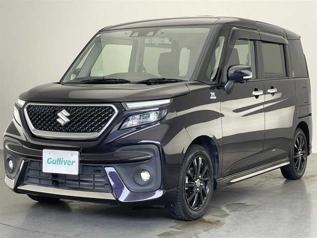 スズキ ソリオ バンディット HV MV 愛知県 2021(令3)年 1.5万km グリッターバイオレットパール 純９型ＤＡナビ　フルセグＴＶ　Ｂｌｕｅｔｏｏｔｈ　全方位カメラ　ＨＵＤ　両側電動スライドドア　前後ドラレコ　衝突軽減　純アルミ付サマータイヤ有　温シート　レーダークルコン　ＬＥＤヘッドライト　禁煙車