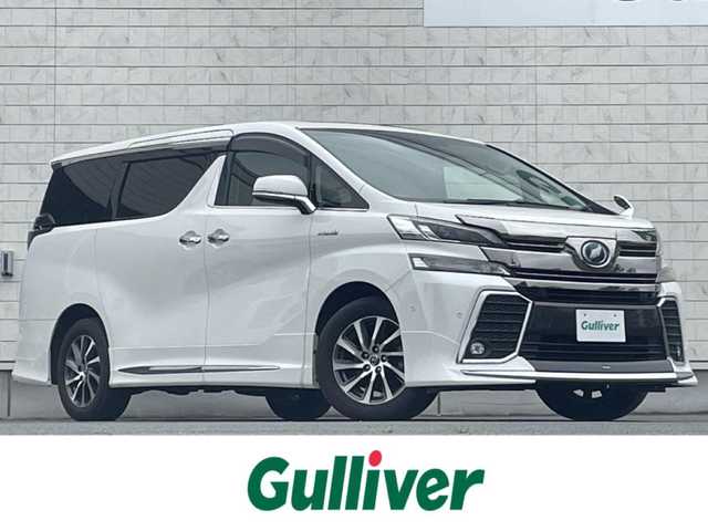 トヨタ ヴェルファイア ハイブリット ZR Gエディション 岩手県 2015(平27)年 7.5万km ホワイトパールクリスタルシャイン ・４WD/・純正ナビ フルセグTV　BT　DVD/・ムーンルーフ/・レザーシート/・モデリスタエアロ/・純正フリップダウンモニター/・JBLサウンド/・両側パワースライドドア/・バックカメラ/・パワーバックドア/・レーダークルーズコントロール/・ステアリングヒーター/・前席シートヒーター/・オートハイビーム/・ECOモード/・EVモード/・ナノイー/・ビルトインETC/・保証書/・取扱説明書/・スペアキー