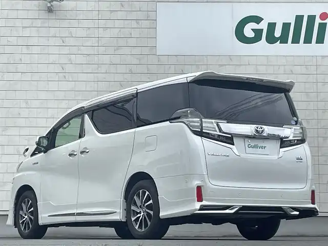 トヨタ ヴェルファイア ハイブリット ZR Gエディション 岩手県 2015(平27)年 7.5万km ホワイトパールクリスタルシャイン ・４WD/・純正ナビ フルセグTV　BT　DVD/・ムーンルーフ/・レザーシート/・モデリスタエアロ/・純正フリップダウンモニター/・JBLサウンド/・両側パワースライドドア/・バックカメラ/・パワーバックドア/・レーダークルーズコントロール/・ステアリングヒーター/・前席シートヒーター/・オートハイビーム/・ECOモード/・EVモード/・ナノイー/・ビルトインETC/・保証書/・取扱説明書/・スペアキー
