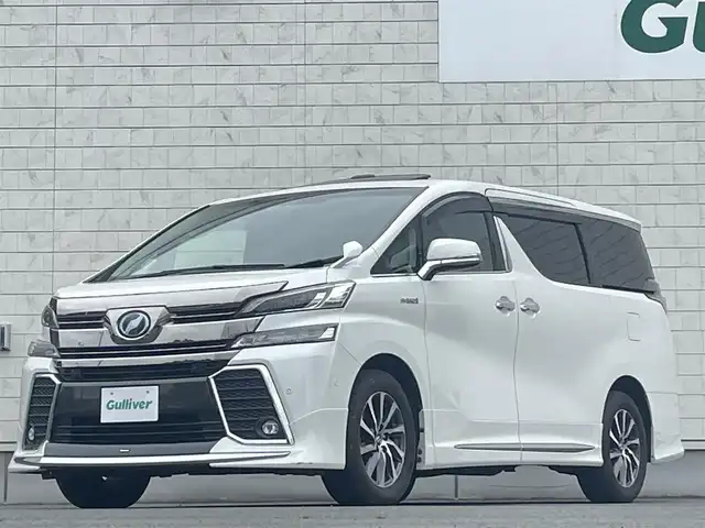 トヨタ ヴェルファイア ハイブリット ZR Gエディション 岩手県 2015(平27)年 7.5万km ホワイトパールクリスタルシャイン ・４WD/・純正ナビ フルセグTV　BT　DVD/・ムーンルーフ/・レザーシート/・モデリスタエアロ/・純正フリップダウンモニター/・JBLサウンド/・両側パワースライドドア/・バックカメラ/・パワーバックドア/・レーダークルーズコントロール/・ステアリングヒーター/・前席シートヒーター/・オートハイビーム/・ECOモード/・EVモード/・ナノイー/・ビルトインETC/・保証書/・取扱説明書/・スペアキー