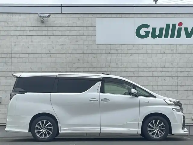 トヨタ ヴェルファイア ハイブリット ZR Gエディション 岩手県 2015(平27)年 7.5万km ホワイトパールクリスタルシャイン ・４WD/・純正ナビ フルセグTV　BT　DVD/・ムーンルーフ/・レザーシート/・モデリスタエアロ/・純正フリップダウンモニター/・JBLサウンド/・両側パワースライドドア/・バックカメラ/・パワーバックドア/・レーダークルーズコントロール/・ステアリングヒーター/・前席シートヒーター/・オートハイビーム/・ECOモード/・EVモード/・ナノイー/・ビルトインETC/・保証書/・取扱説明書/・スペアキー
