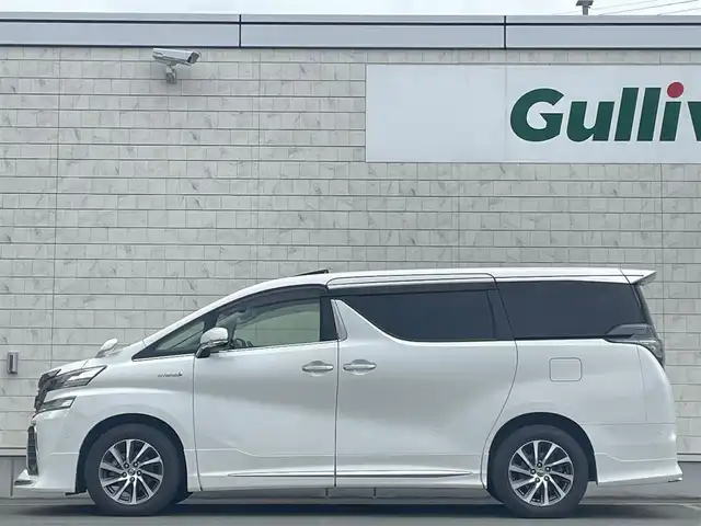 トヨタ ヴェルファイア ハイブリット ZR Gエディション 岩手県 2015(平27)年 7.5万km ホワイトパールクリスタルシャイン ・４WD/・純正ナビ フルセグTV　BT　DVD/・ムーンルーフ/・レザーシート/・モデリスタエアロ/・純正フリップダウンモニター/・JBLサウンド/・両側パワースライドドア/・バックカメラ/・パワーバックドア/・レーダークルーズコントロール/・ステアリングヒーター/・前席シートヒーター/・オートハイビーム/・ECOモード/・EVモード/・ナノイー/・ビルトインETC/・保証書/・取扱説明書/・スペアキー
