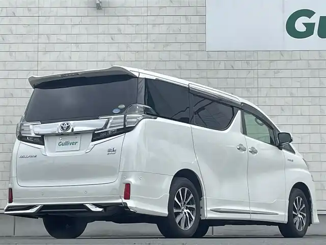 トヨタ ヴェルファイア ハイブリット ZR Gエディション 岩手県 2015(平27)年 7.5万km ホワイトパールクリスタルシャイン ・４WD/・純正ナビ フルセグTV　BT　DVD/・ムーンルーフ/・レザーシート/・モデリスタエアロ/・純正フリップダウンモニター/・JBLサウンド/・両側パワースライドドア/・バックカメラ/・パワーバックドア/・レーダークルーズコントロール/・ステアリングヒーター/・前席シートヒーター/・オートハイビーム/・ECOモード/・EVモード/・ナノイー/・ビルトインETC/・保証書/・取扱説明書/・スペアキー