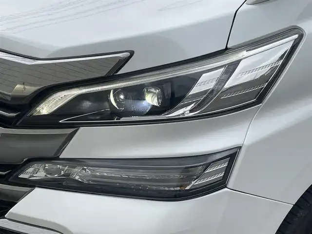 トヨタ ヴェルファイア ハイブリット ZR Gエディション 岩手県 2015(平27)年 7.5万km ホワイトパールクリスタルシャイン ・４WD/・純正ナビ フルセグTV　BT　DVD/・ムーンルーフ/・レザーシート/・モデリスタエアロ/・純正フリップダウンモニター/・JBLサウンド/・両側パワースライドドア/・バックカメラ/・パワーバックドア/・レーダークルーズコントロール/・ステアリングヒーター/・前席シートヒーター/・オートハイビーム/・ECOモード/・EVモード/・ナノイー/・ビルトインETC/・保証書/・取扱説明書/・スペアキー