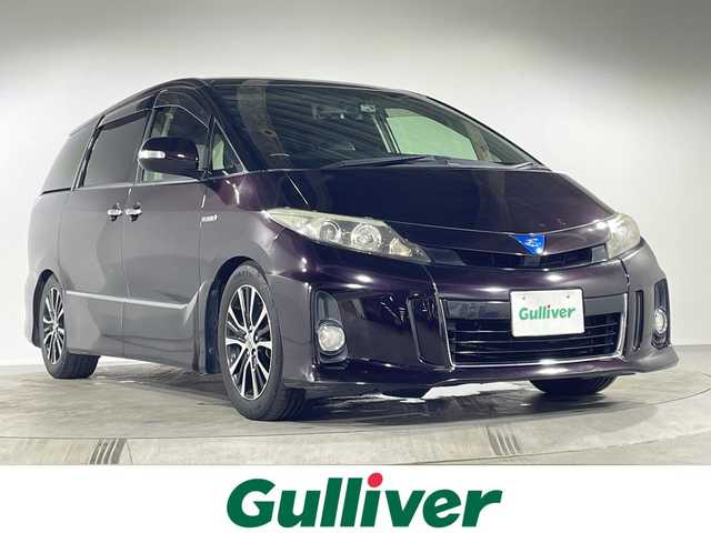 トヨタ エスティマ ハイブリッド アエラス レザーパッケージ 福岡県 2013(平25)年 16.3万km ボルドーマイカメタリック サンルーフ/純正HDDナビ/・CD/DVD/BT/フルセグTV/・バックモニター/純正フリップダウンモニター/クルーズコントロール/パワーバックドア/両側パワースライドドア/革シート/・パワーシート(D)/・シートヒーター(D/N)/PRO210車高調/ドライブレコーダー前後/ETC/AC100V/キセノンライト/・オートライト/・フォグランプ/革巻きステアリング/・ステアリングリモコン