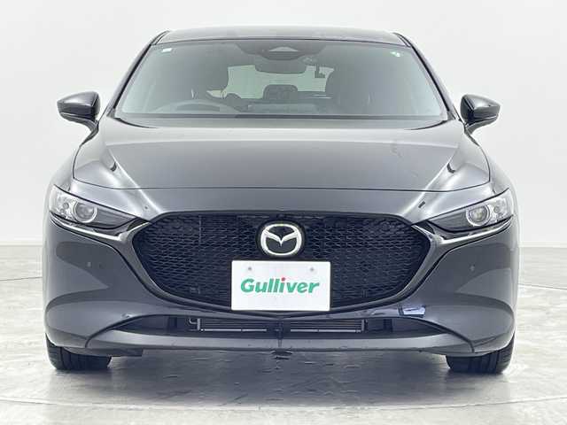 マツダ マツダ３ファストバック 15S ツーリング 群馬県 2023(令5)年 1.6万km ジェットブラックマイカ 純正１０．２５型ナビ　全周囲カメラ　衝突被害軽減ブレーキ　ブラインドスポットモニター　アダプティブクルーズコントロール　前後ドライブレコーダー　ETC 置くだけ充電器　LED オートハイビーム　禁煙車