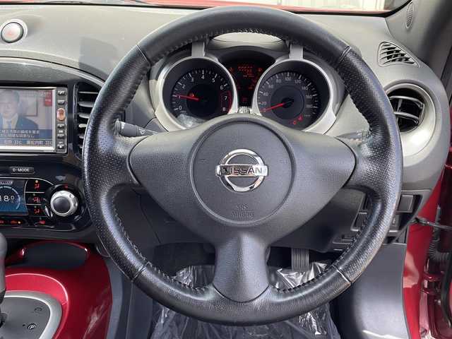 日産 ジューク 16GT FOUR 道北・旭川 2011(平23)年 10万km ラディアントレッド ・4WD/・純正デーラーオプションナビ/　CD/DVD/BT/TV/・バックカメラ/・オートライト/・革巻きステアリング/・スマートキー/・プッシュスタート/・純正エンジンスターター/・横滑り防止/・ETC/・保証書/取説/・純正フロアマット/・ドアバイザー/・社外AW付冬タイヤ積込