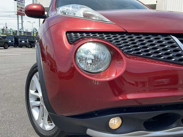 日産 ジューク 16GT FOUR 道北・旭川 2011(平23)年 10万km ラディアントレッド ・4WD/・純正デーラーオプションナビ/　CD/DVD/BT/TV/・バックカメラ/・オートライト/・革巻きステアリング/・スマートキー/・プッシュスタート/・純正エンジンスターター/・横滑り防止/・ETC/・保証書/取説/・純正フロアマット/・ドアバイザー/・社外AW付冬タイヤ積込