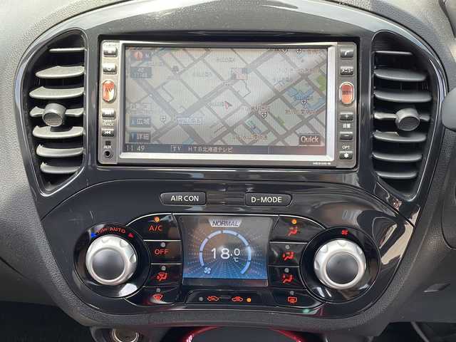 日産 ジューク 16GT FOUR 道北・旭川 2011(平23)年 10万km ラディアントレッド ・4WD/・純正デーラーオプションナビ/　CD/DVD/BT/TV/・バックカメラ/・オートライト/・革巻きステアリング/・スマートキー/・プッシュスタート/・純正エンジンスターター/・横滑り防止/・ETC/・保証書/取説/・純正フロアマット/・ドアバイザー/・社外AW付冬タイヤ積込