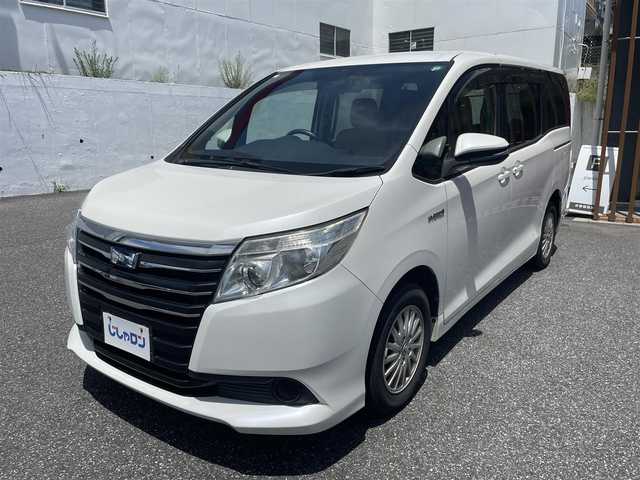 トヨタ ノア ハイブリッド X 千葉県 2014(平26)年 13.3万km ホワイトパールクリスタルシャイン (株)IDOMが運営する【じしゃロン八千代店】の自社ローン専用車両になります。こちらは現金またはオートローンご利用時の価格です。自社ローンご希望の方は別途その旨お申付け下さい/純正メモリーナビ/純正CD/BT/ワンセグ/バックカメラ/両側パワースライドドア/LEDライト/ETC
