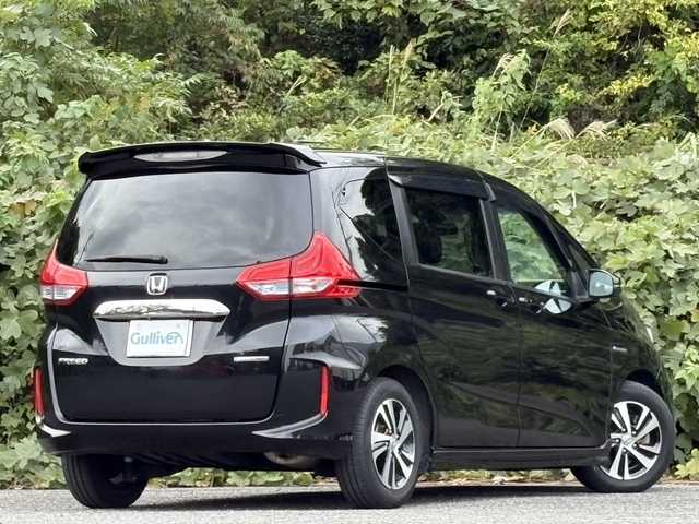 ホンダ フリード ハイブリット EX 大分県 2017(平29)年 11.8万km クリスタルブラックパール ホンダセンシング /両側パワースライドドア/モデューロエアロパーツ/純正メモリーナビ/バックカメラ/フルセグ/DVD/Bluetooth/ハーフレザーシート/シートヒーター/アダプティブクルーズコントロール/レーンキープアシスト/ビルトインETC/純正LEDヘッドライト/オートライトコントロール/スマートキー/エンジンプッシュスタート/純正15インチアルミホイール