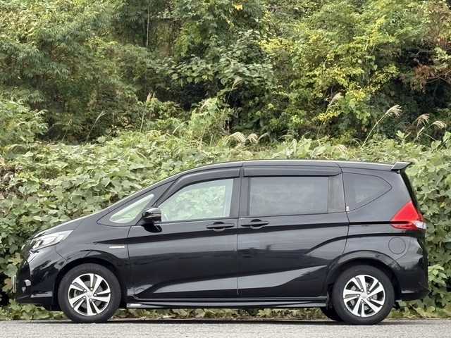 ホンダ フリード ハイブリット EX 大分県 2017(平29)年 11.8万km クリスタルブラックパール ホンダセンシング /両側パワースライドドア/モデューロエアロパーツ/純正メモリーナビ/バックカメラ/フルセグ/DVD/Bluetooth/ハーフレザーシート/シートヒーター/アダプティブクルーズコントロール/レーンキープアシスト/ビルトインETC/純正LEDヘッドライト/オートライトコントロール/スマートキー/エンジンプッシュスタート/純正15インチアルミホイール