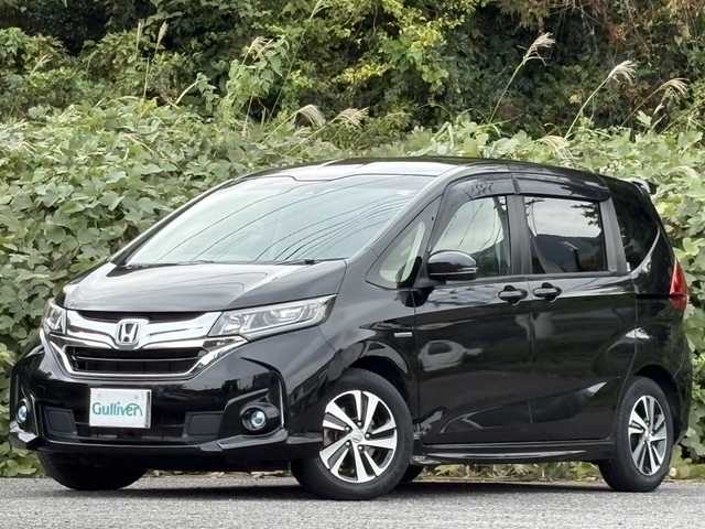 ホンダ フリード ハイブリット EX 大分県 2017(平29)年 11.8万km クリスタルブラックパール ホンダセンシング /両側パワースライドドア/モデューロエアロパーツ/純正メモリーナビ/バックカメラ/フルセグ/DVD/Bluetooth/ハーフレザーシート/シートヒーター/アダプティブクルーズコントロール/レーンキープアシスト/ビルトインETC/純正LEDヘッドライト/オートライトコントロール/スマートキー/エンジンプッシュスタート/純正15インチアルミホイール