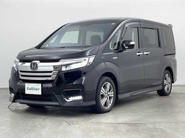ホンダ ステップワゴン スパーダ ハイブリッド G ホンダセンシング 兵庫県 2018(平30)年 5.3万km プレミアムスパークルブラックパール ・純正9型ナビ＆フルセグ＆BT＆DVD/・バックカメラ/・両側パワースライドドア/・Honda SENSING/・衝突軽減ブレーキ/・レーンキープアシスト/・レーダークルーズコントロール/・路外逸脱抑制機能/・誤発進抑制機能/・渋滞追従機能付/・LKAS〈車線維持支援システム〉/・先行車発進お知らせ機能/・標識認識機能/・スマートキー/・プッシュスタート/・ビルトインETC/・純正フロアマット/・純正16インチアルミホイール/・LEDヘッドライト/・フォグ/・オートライト/・ステアリングスイッチ/・ドアバイザー