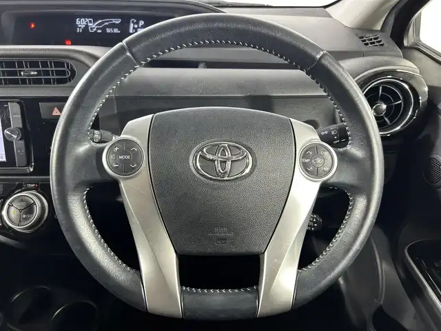 トヨタ アクア G 佐賀県 2015(平27)年 7.7万km チェリーパールクリスタルシャイン 純正7インチナビ/DVD/CD/Bluetooth/SD/フルセグTV/バックカメラ/ETC/エコモード/ドライブモード/クルーズコントロール/横滑り防止装置/オートライト/ドアバイザー/純正フロアマット/スマートキー/AAC/ドアバイザー/ヘッドライトレベライザー/ワンオーナー