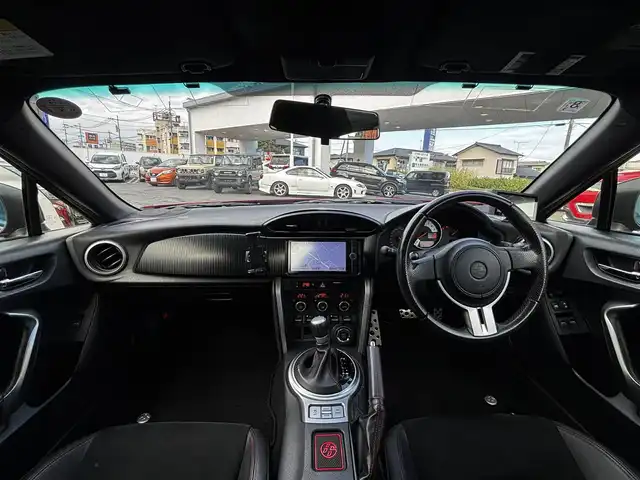 トヨタ ８６ GT リミテッド 熊本県 2012(平24)年 9.1万km ライトニングレッド HKSマフラー/POTENZA17インチAW/純正SDナビ（NSZT-W62G）/【フルセグTV/CD/DVD/SD/BT】/バックカメラ/パドルシフト/ハーフレザーシート/D/Nシートヒーター/HIDオートライト/純正フロアマット/プッシュスタート/スマートキー/スペアキー/取扱説明書(車両/ナビ)