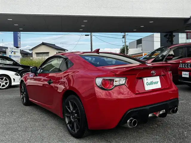 トヨタ ８６ GT リミテッド 熊本県 2012(平24)年 9.1万km ライトニングレッド HKSマフラー/POTENZA17インチAW/純正SDナビ（NSZT-W62G）/【フルセグTV/CD/DVD/SD/BT】/バックカメラ/パドルシフト/ハーフレザーシート/D/Nシートヒーター/HIDオートライト/純正フロアマット/プッシュスタート/スマートキー/スペアキー/取扱説明書(車両/ナビ)
