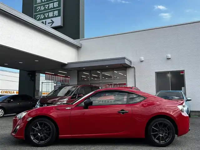 トヨタ ８６ GT リミテッド 熊本県 2012(平24)年 9.1万km ライトニングレッド HKSマフラー/POTENZA17インチAW/純正SDナビ（NSZT-W62G）/【フルセグTV/CD/DVD/SD/BT】/バックカメラ/パドルシフト/ハーフレザーシート/D/Nシートヒーター/HIDオートライト/純正フロアマット/プッシュスタート/スマートキー/スペアキー/取扱説明書(車両/ナビ)