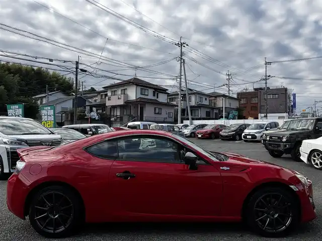 トヨタ ８６ GT リミテッド 熊本県 2012(平24)年 9.1万km ライトニングレッド HKSマフラー/POTENZA17インチAW/純正SDナビ（NSZT-W62G）/【フルセグTV/CD/DVD/SD/BT】/バックカメラ/パドルシフト/ハーフレザーシート/D/Nシートヒーター/HIDオートライト/純正フロアマット/プッシュスタート/スマートキー/スペアキー/取扱説明書(車両/ナビ)