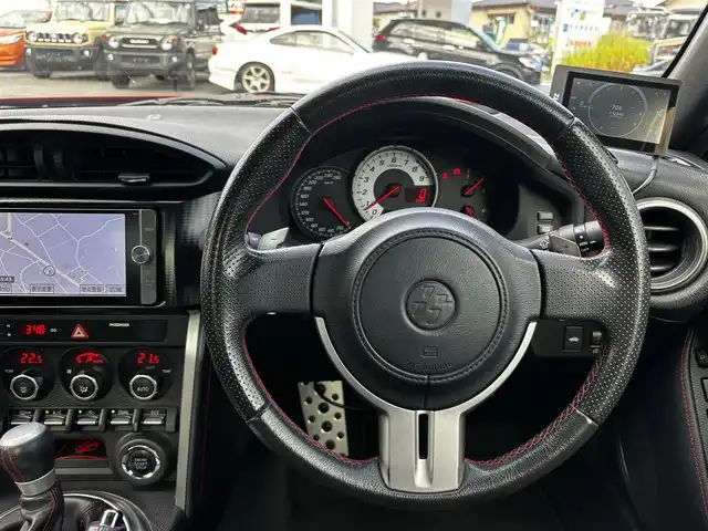 トヨタ ８６ GT リミテッド 熊本県 2012(平24)年 9.1万km ライトニングレッド HKSマフラー/POTENZA17インチAW/純正SDナビ（NSZT-W62G）/【フルセグTV/CD/DVD/SD/BT】/バックカメラ/パドルシフト/ハーフレザーシート/D/Nシートヒーター/HIDオートライト/純正フロアマット/プッシュスタート/スマートキー/スペアキー/取扱説明書(車両/ナビ)