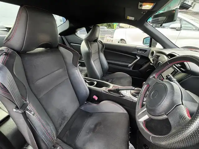 トヨタ ８６ GT リミテッド 熊本県 2012(平24)年 9.1万km ライトニングレッド HKSマフラー/POTENZA17インチAW/純正SDナビ（NSZT-W62G）/【フルセグTV/CD/DVD/SD/BT】/バックカメラ/パドルシフト/ハーフレザーシート/D/Nシートヒーター/HIDオートライト/純正フロアマット/プッシュスタート/スマートキー/スペアキー/取扱説明書(車両/ナビ)