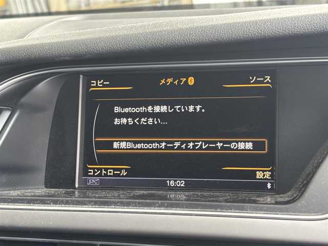 アウディ Ａ４ アバント 2．0 TFSI 東京都 2014(平26)年 8.1万km パール 右ハンドル/CVT（マルチトロニック）/５人乗り/開口部横３本桟フロントバンパー/下部ブラックリアバンパー/４本スポーク革巻きステアリングホイール/マイクロメタリックプラチナムインパネ加飾/クロスシート/スカッフプレート/ナビ/バックカメラ/アダプティブクルーズコントロール/パワーバックドア/パワーシート/シートメモリー/シートヒーター/パーキングソナー/ＥＴＣ/デジタルエアーライドコントロールシステム/車高調