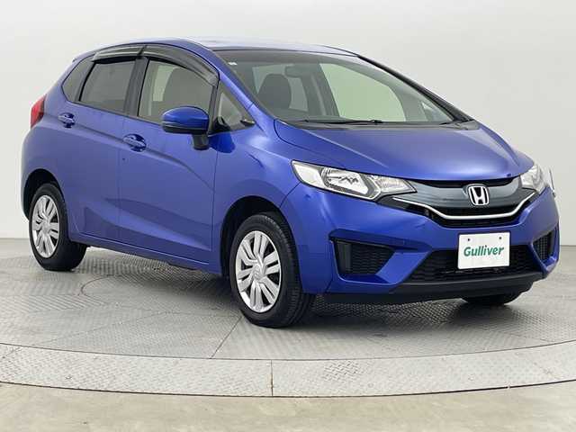 ホンダ フィット 13G Fパッケージ 新潟県 2015(平27)年 7.1万km ブリリアントスポーティブルーメタリック2トーン 4WD/スマートキー/メモリナビ　型式MDV-L402/CD/DVD/SD/ワンセグ/バックカメラ/バイザー/フロアマット/スタッドレスタイヤ4本セット/取扱説明書